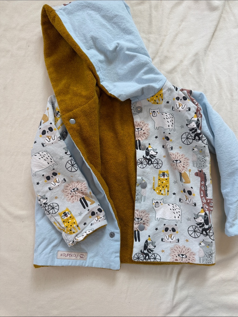 Animal print fleece-lined coat (fits like 2T)